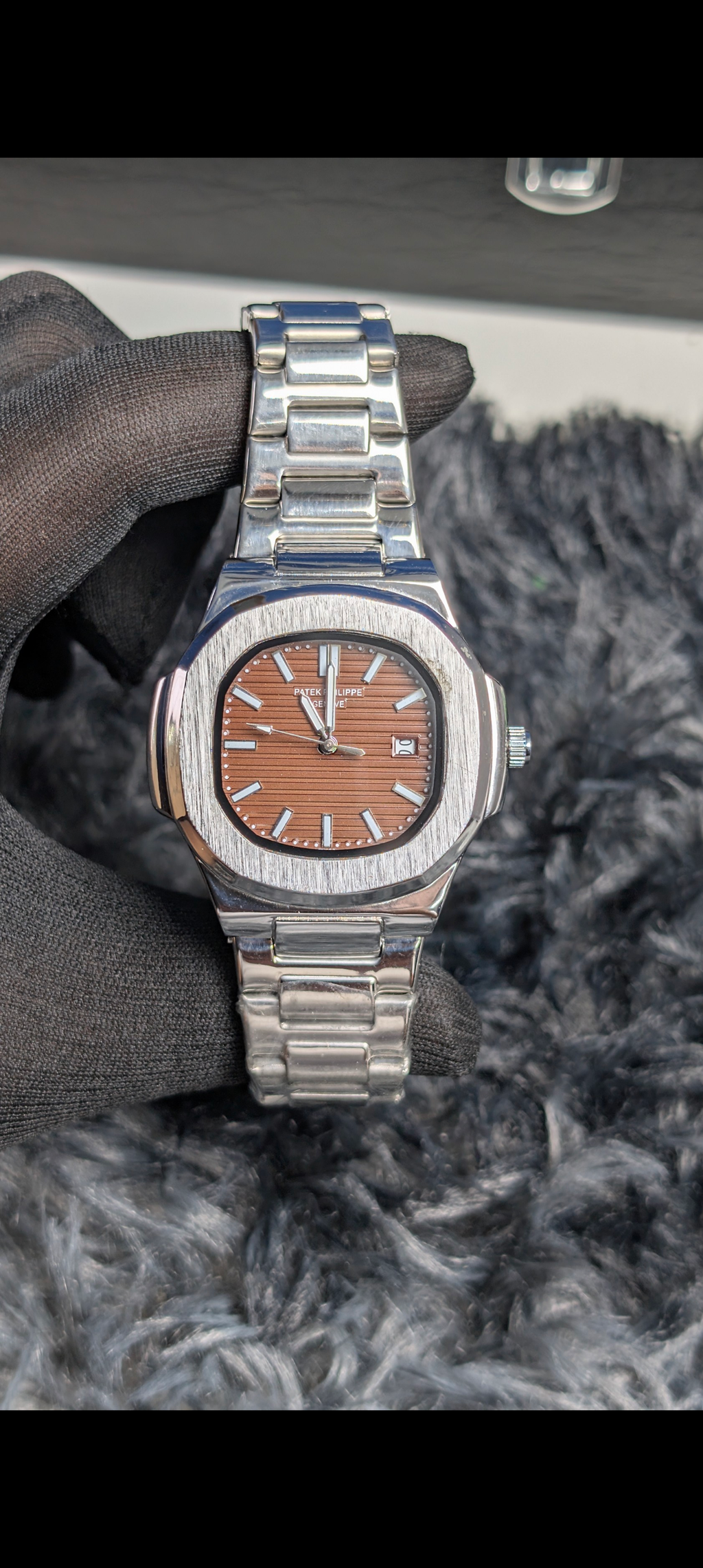 PP  - Geneve Nautilus Series Icon Brown